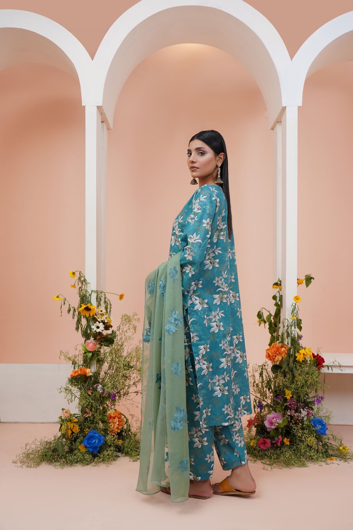 Pakistani three piece ladies suit in teal with a printed dupatta