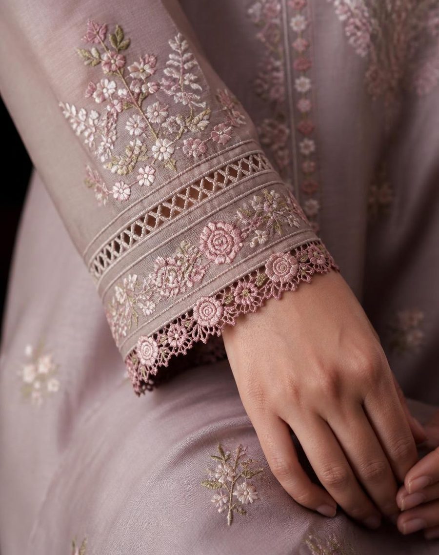 Embroidered cuff detail on the sleeve of a stitched ladies suit