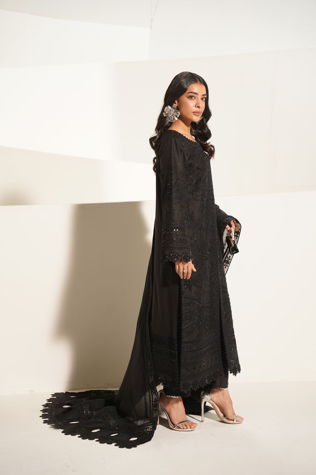 Black formal Pakistani ladies suit with fine finishing