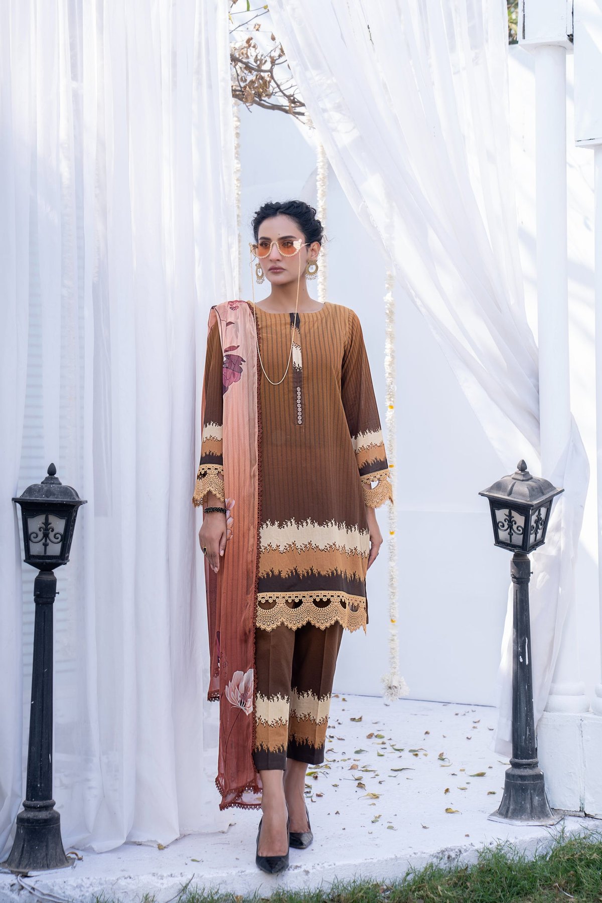 Brown three piece suit with banded, lace trimmed trousers