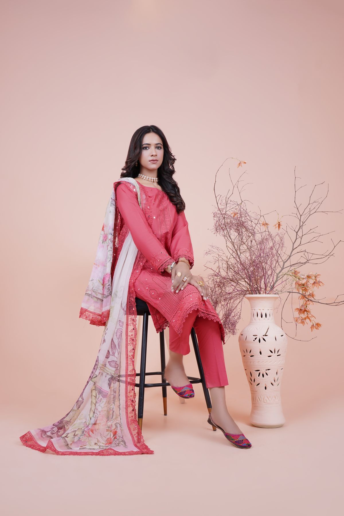 Coral Pakistani ladies suit stitched from a customer's own design